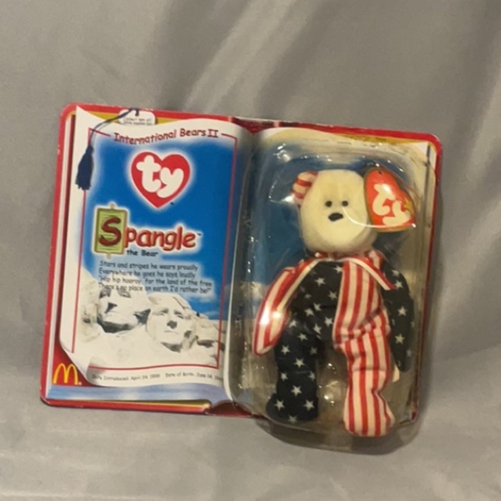 Conditions is ok it’s a 1999 Ty name spangle the bear has been opened